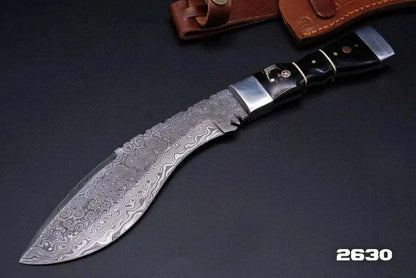 Damascus Steel Kukri Style Knife with pattern welded blade and leather sheath.