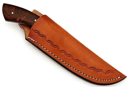 Damascus Steel Hunting Knife with custom leather sheath and wood handle.