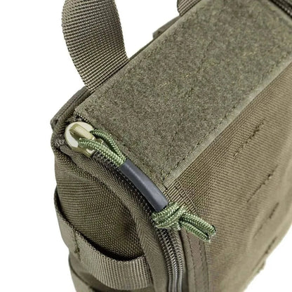 Compact first aid pouch made of Cordura with MOLLE compatibility.