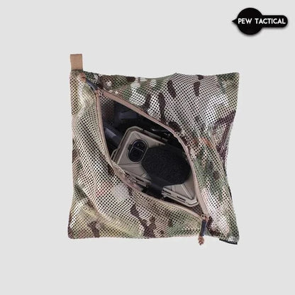 Camouflage mesh storage bag with diagonal zipper and toggle, ideal for small items.