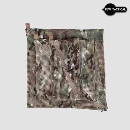 Mesh Storage Bag in camouflage design with diagonal zippers and toggles for easy access, ideal for tactical and everyday use.