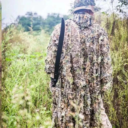 Camouflage Ghillie Suit for hunting in green terrain.